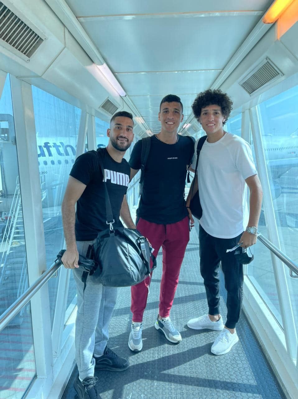 May be an image of 3 people, people standing and indoor
