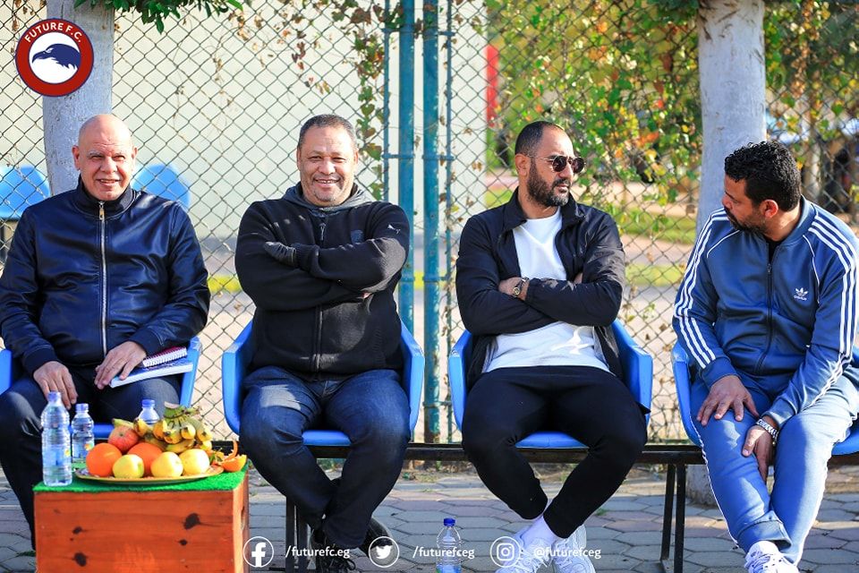 May be an image of 4 people, people sitting and outdoors