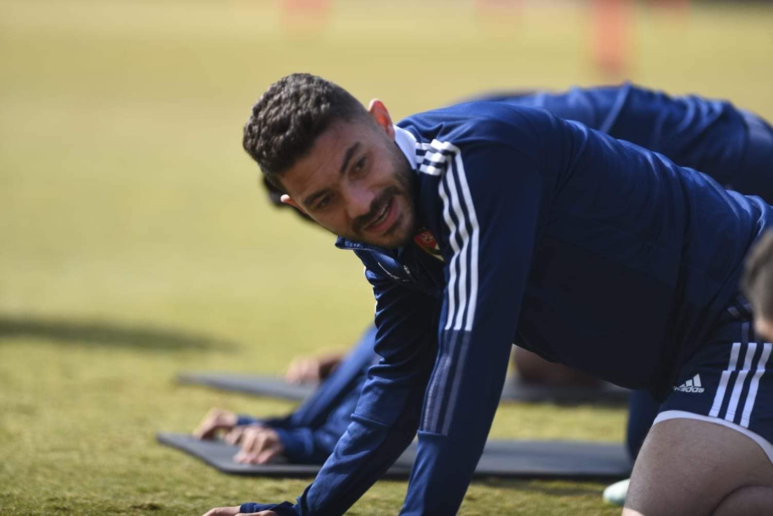 May be an image of 1 person and grass