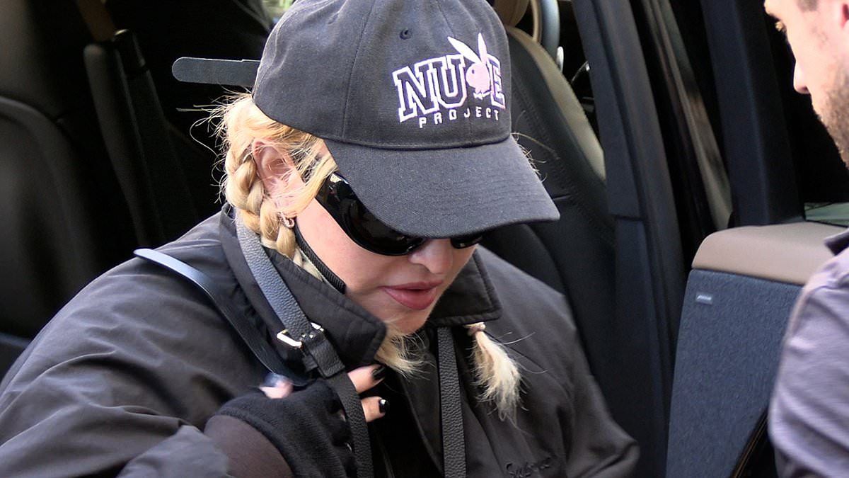 Madonna, 65, cuts a low-key figure as she visits the Casa Batlló in  Barcelona after