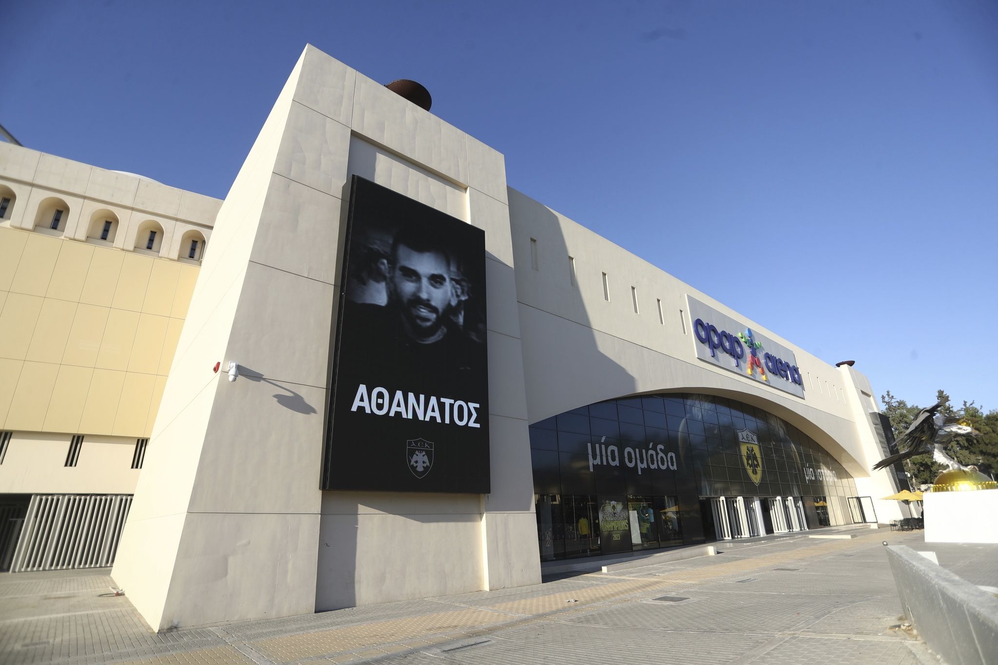 A banner depicting AEK Athens fan Michalis Katsouris outside AEK's Opap Arena