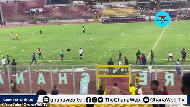 A number of Premier League stars were ushered to safety as Ghana fans invaded the pitch and threw missiles, according to a report