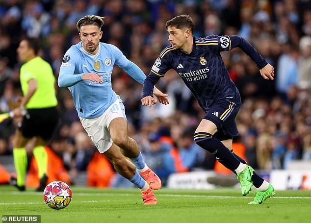 Players using tiny shin pads is a trend many believe was started by City's Jack Grealish (left)