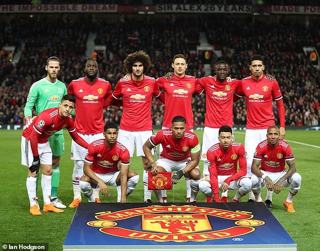 Alexis Sanchez pictured (left, leaning forwards) lining up for a team photo ahead of a UEFA Champions League game between Manchester United and Valencia in March 2018