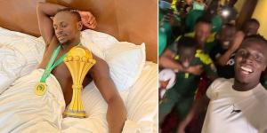 A night to remember! Sadio Mane takes the AFCON trophy to BED with him while goalkeeper Edouard Mendy dances through the hotel corridors with jubilant team-mates after Senegal's shootout success over Egypt
