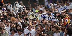 'Kylian Mbappé, son of a b****!': Real Madrid fans launch scathing attack on PSG's star man during Champions League parade... after the French star's controversial decision to snub a move to Los Blancos
