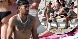 Pierre-Emerick Aubameyang shows off his tattooed physique as he hits the beach in Mykonos during a post-season break with his wife Alysha Behague and their sons