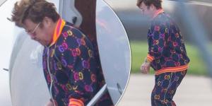 Sir Elton John cuts a casual figure in a colourful tracksuit as he lands in Liverpool ahead of his Farewell Yellow Brick Road concert