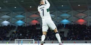 Cristiano Ronaldo tries out a new celebration after scoring Portugal's first goal in 6-0 hammering of Luxembourg as the Al-Nassr man notches his 121st and 122nd goals for his country 