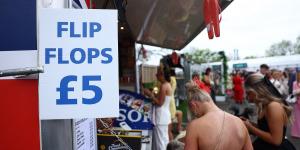 The real winners at the Grand National: Stalls selling flip-flops for £5 clean up on Ladies' Day - as racegoers joke they're making 'even more than the bookies'