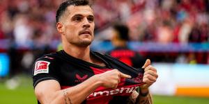 Granit Xhaka hails Bayer Leverkusen's historic title triumph as 'special'... but insists newly-crowned Bundesliga champions are hungry for more as Xabi Alonso's men eye an unprecedented unbeaten treble