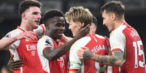 Theo Walcott makes bold Arsenal prediction as Gunners return to the top with victory at Wolves - as Jamie Redknapp names his favourites for the title next season