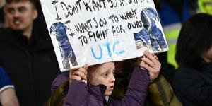 Young Chelsea fan holds up brutal sign telling Mauricio Pochettino's flops he 'DOESN'T want their shirts' during 5-0 Arsenal drubbing, before captain Conor Gallagher responds to it at full-time