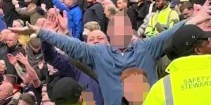 Burnley fan is spotted making sick gestures mocking the Munich air disaster during draw with Man United at Old Trafford... as club vow to help police 'identify and prosecute' supporters over tragedy chanting