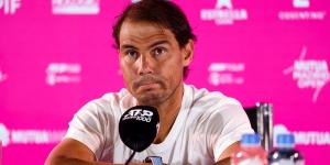 Rafael Nadal admits he's still unsure whether he'll play at the French Open next month - as the 14-time winner advances in Madrid on his return from his latest hip issue