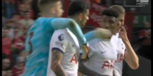 Tottenham defenders Cristian Romero and Emerson Royal break into a heated argument before Guglielmo Vicario intervenes during clash with Liverpool