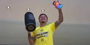 Jadon Sancho leads Borussia Dortmund's dressing room celebrations after beating PSG to reach Champions League final as Man United outcast belts out rendition of Adele hit