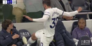 Tottenham star Rodrigo Bentancur LOSES IT as he furiously kicks his chair three times after being subbed off in 2-0 Man City defeat... while a worried Bryan Gil watches on next to him