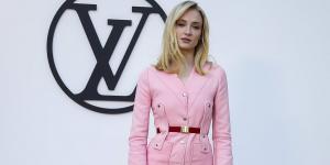 Sophie Turner wows in a baby pink co-ord as she joins Hollywood stars Ana De Armas and Jennifer Connelly at Louis Vuitton Cruise 2025  show in Barcelona - while demonstrators clash with police over fashion event's use of a public park