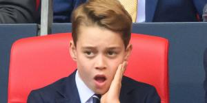 Not a Man United fan then, George? Prince, 10, yawns and looks glum as he joins dad William at Wembley for the FA Cup final