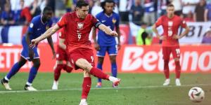 France 1-1 Poland: Robert Lewandowski's re-taken penalty keeps Les Bleus from the top spot in Group D... but a masked Kylian Mbappe breaks his Euros duck as he returns to the starting XI