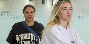 Sam Kerr and her fiancee Kristie Mewis touch down in Australia for the first time since she was charged with racially harassing a cop - hours after couple were dealt bad news