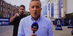 Serial prankster Jarvo waves sex toy in face of Sky Sports reporter on live deadline day coverage, forcing broadcast to halt and journalist to move location outside Chelsea