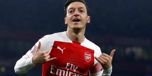 Mesut Ozil shows off his staggering body transformation over the last year as the former Arsenal star shares a video of his rigorous gym workouts