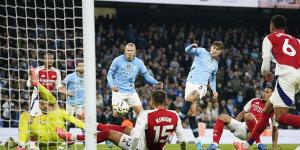 Manchester City rescue draw against Arsenal with late goal from Stones