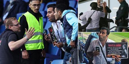 SPECIAL REPORT: Iran are in chaos ahead of the World Cup as unrests grows in the country... protestors ejected from Uruguay friendly by police, our reporter was banned from attending and players were 'forced to delete' their support online