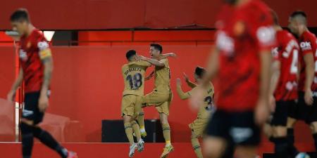 Lewandowski fires Barcelona to a hard-fought victory in Mallorca