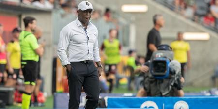 Dwight Yorke fears he may have to BUY a football club to secure a head coaching gig in English football as the ex-Manchester United star laments the 'struggles of black managers'