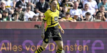 Marius Wolf responds to shocking video of Borussia Dortmund supporter STEALING Julian Brandt's shirt from a fan in a wheelchair... as defender says they will sort the situation