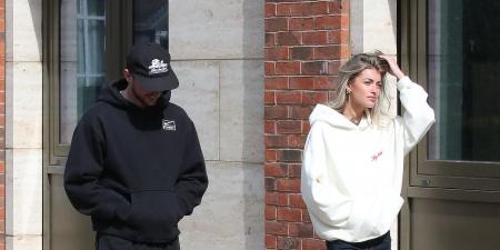 Man United star Mason Mount is spotted walking with a mystery blonde woman in Altrincham... before midfielder finds parking ticket on his £120,000 Land Rover