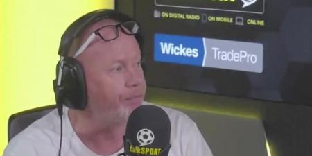 Arsenal legend Perry Groves is blasted by a Tottenham fan for celebrating a Gunners goal in the home end while on commentary duty during North London Derby... as supporter claims he 'wants to report a hate crime'