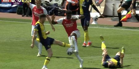 VAR-sical! Fans FUME after Ryan Christie's high tackle on Bukayo Saka wasn't punished with a red card in Arsenal's crucial match against Bournemouth