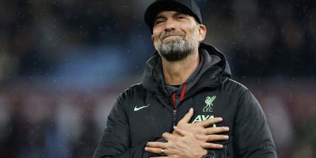 Jurgen Klopp walks alone... Liverpool boss is spotted soaking it all in at Anfield, standing in the centre circle and in the stands as he prepares to bid emotional farewell after nine years at the club