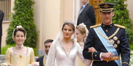 The glamorous TV news anchor who became a queen: Pictures show the stunning wedding of King Felipe and Letizia of Spain 20 years ago today - as the couple celebrate anniversary amidst affair claim