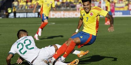 Luis Diaz is caught by HORROR two-footed tackle in Colombia's friendly win against Bolivia as Liverpool fans fume over 'disgrace' as opposing defender isn't sent off