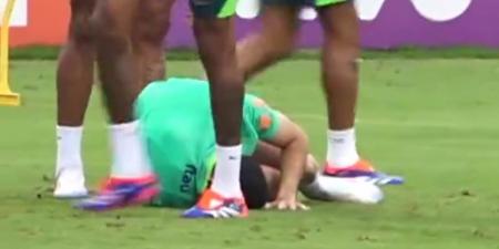 Arsenal fans are left fuming after their star Gabriel Martinelli is CLATTERED and forced out of Brazil training - while team-mate who tackled him doesn't appear to care