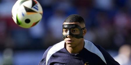 Eagle-eyed fans spot Kylian Mbappe detail during BBC's pinball intro for France's Euro 2024 game against Poland... with the Les Bleus captain donning a mask for the first time since breaking his nose