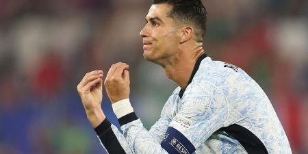 Watch jaw-dropping moment Cristiano Ronaldo narrowly avoids being two-footed by crazed fan who leapt at Portugal star