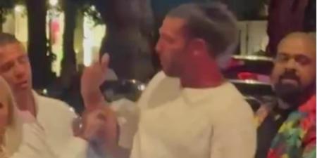 Former England star Andy Carroll spotted yelling 'You f***ing want some?' at bystanders after the ex-Liverpool forward was embroiled in a '1am street brawl in Mayfair'