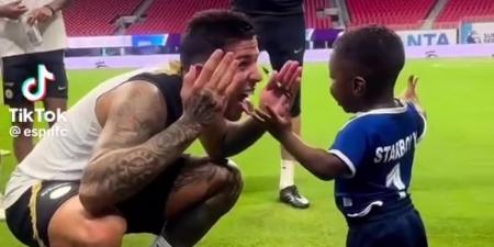 Nicolas Jackson DEFENDS team-mate Enzo Fernandez amid Argentina's racism storm by posting bizarre video of his under-fire team-mate playing with a black child as Chelsea's dressing room split deepens