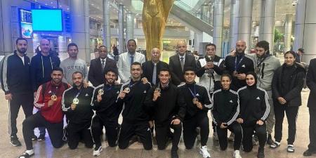 عودة بعثة منتخب الكاراتيه للقاهرة بعد إنجاز كأس العالم في إسبانيا