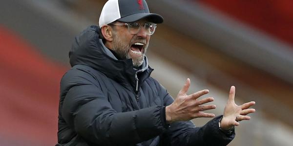 Klopp challenges Liverpool to 'earn' UCL return