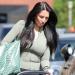 Annie Kilner steps out in Cheshire with her baby son just seven days after giving birth - amid claims she has put her troubles with cheating Kyle Walker to one side for the 'sake of their kids'
