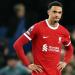 Too much for Trent! Liverpool star Alexander-Arnold hides on the Reds bench and stops watching against Everton as title hopes slip away in crushing Merseyside derby defeat