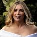 Cam Reading looks stylish in Bardot top as she joins fellow Manchester United WAGS Anouska Santos, Claudia Pinto Lopes and pregnant Roosee Xavier