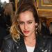 Model Alice Dellal, 36, reveals she is expecting her first child as she shares bump snap - after finding love with pro skateboarder Charlie Birch, 25